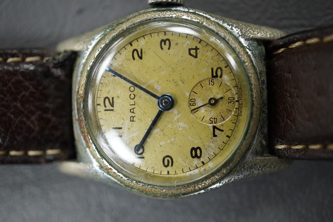 A lady's 18k Baume & Mercier quartz dress wrist watch, with Arabic dial, case diameter 27mm, the case back numbered 15602 1877944, on a Baume & Mercier black leather strap, together with a base metal Ralco manual wind wr